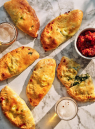 Spanakopita Calzones with Red Sauce 