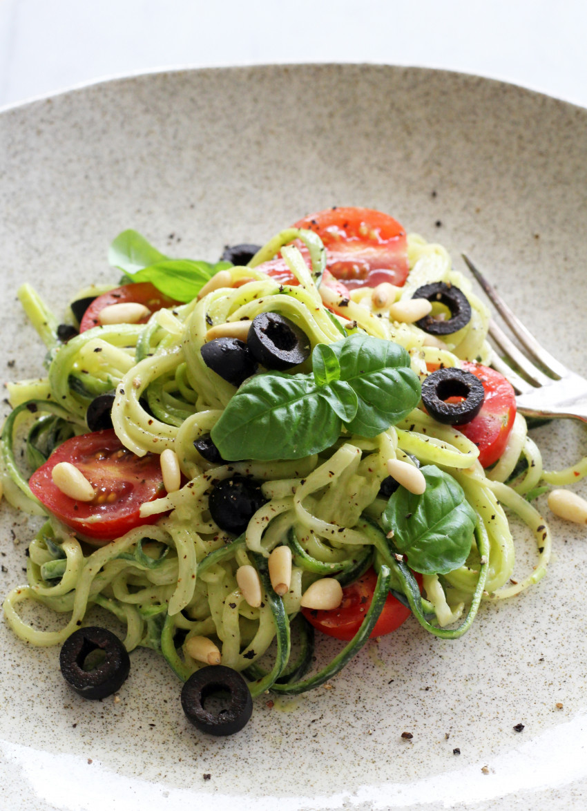 Zucchini Noodles with Creamy Avocado Sauce, Black Olives and Cherry Tomatoes